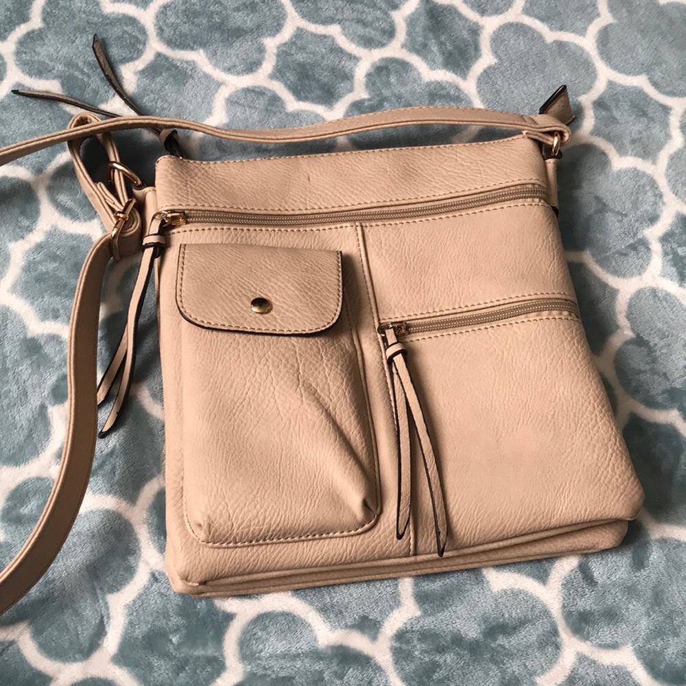 Worn once tan cross body bag